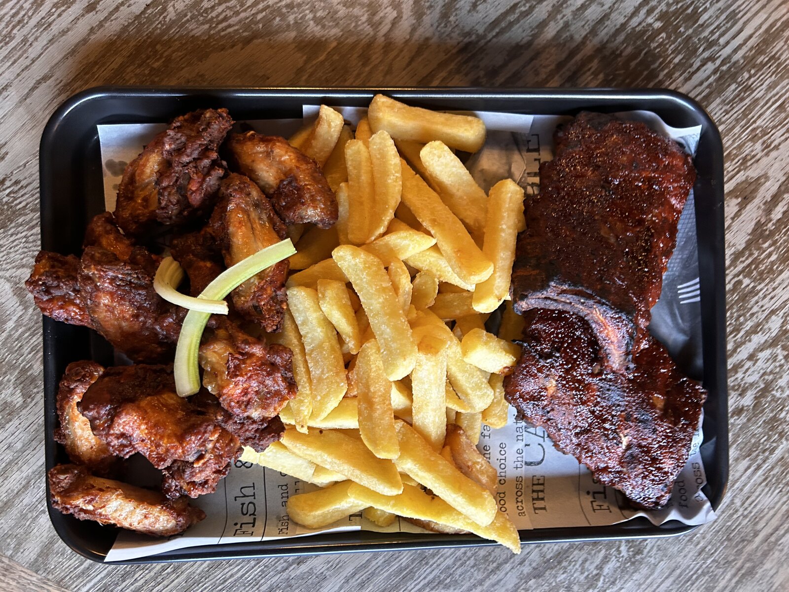 Ribs and wings combo plate.